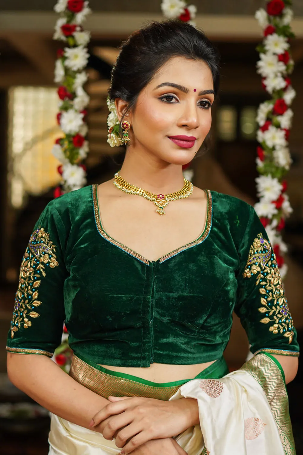 Green velvet sweetheart neck blouse with zardosi work
